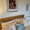 Peaceful garden view double with ensuite in house opposite beach, with access to private garden and bike store