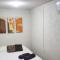 Suite con 2 recamaras,2mini splits, Parking Wifi 100 mb, cocina - 巴耶斯城