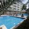 Condo Azur Suites A326 Amani Resorts Residences , 5 minutes Airport, Netflix, Stylish, Cozy with Luxurious Swimming Pool