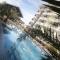Condo Azur Suites A326 Amani Resorts Residences , 5 minutes Airport, Netflix, Stylish, Cozy with Luxurious Swimming Pool