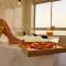 FRATELLI CORP APART HOTEL