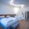 Maxim Suites by Elias Holl