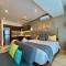 Unwind | Private Balcony & Rooftop Pools | Casago Unwind | Private Balcony & Rooftop Pools | Casago