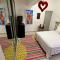 In the heart of Condado a 2 Bedroom Apartment Balcony