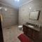 Casa com dois quartos,dois banheiros,sendo uma suíte,sala de estar cozinha e garagem - بوكوس دي كالداس