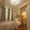 Scarlet Suites Condominium - Babak