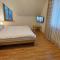 Apartamentai šalia baseino
