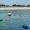 LocaLise - A18 - Appartement avec balcon - Petite vue mer à travers le palmier - Piscine de avril à septembre - Wifi inclus - Animaux admis - Draps inclus - Parking inclus - Le Guilvinec