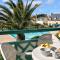 LocaLise - A18 - Appartement avec balcon - Petite vue mer à travers le palmier - Piscine de avril à septembre - Wifi inclus - Animaux admis - Draps inclus - Parking inclus