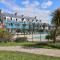 LocaLise - A18 - Appartement avec balcon - Petite vue mer à travers le palmier - Piscine de avril à septembre - Wifi inclus - Animaux admis - Draps inclus - Parking inclus - Le Guilvinec