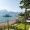 SalvatoreHomes - Luxurious Dreamview Waterfront Apartment in Torri del Benaco with Pool