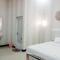 Urbanview Hotel Rifal Home Tegal