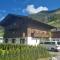 SKILL Mountain Lodge - Ski und Bike Hostel im Sommer mit JOKER CARD