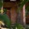 2 bedroom apartment in lush garden, 3 blocks from beach and center of San Juan