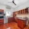 Masterfully Restored Queenslander Near Esplanade