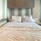 RedLiving Apartemen Grand Kamala Lagoon by Ownr Room