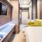 RedLiving Apartemen Grand Kamala Lagoon by Ownr Room