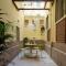 Vintage Romance Patio Apartment by Oteego