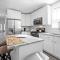 Newly rehabbed Greystone with 2 private apartments, backyard, garage, laundry, close to expressway