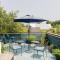Elegant Sunlit Home with Private Rooftop Oasis