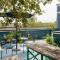 Elegant Sunlit Home with Private Rooftop Oasis