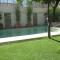 Apartamento Bizcocheros con piscina y jardín privado