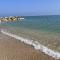 Villa I Giardini del Conero con ombrellone in spiaggia