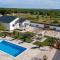 Holiday home Aprilis with pool, jacuzzi and sauna