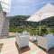 Radici House - Elegant apt with Patio and View