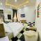 Central Oasis - Entire 3 Bedroom Apartment in Abuja with Pool, Games, WiFi, Balcony, and Garden