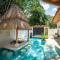 Bohemian Tropical Villa with a Tiki-Style Swimming Pool & Swim-Up Bar with an Attached Studio Apartment Bohemian Tropical Villa with a Tiki-Style Swimming Pool & Swim-Up Bar with an Attached Studio Apartment