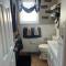 Stylish Cozy Quiet Family Retreat and Romantic getaway Sleeps up to 7 with Fast Wifi, Free Parking, Work station, Alexa enabled, Fenced in Backyard for Pets Grill Party Patio, Porch, Beach, Canal, stadium,Boardwalk Restaurants, and much more!