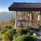 Private Mountain Log Cabin with amazing panoramic sunset views at small scale nature resort