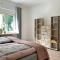 Erdgeschoss-Wohnung mit 2 Schlafzimmern, Balkon und Parkplatz