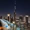 64th floor rooftop pool offering amazing Burj Khalifa views, 2BR apartment in Paramount Hotel Midtown - دبي