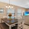 Marvel at the spectacular views from this bright corner condo! - New Smyrna Beach