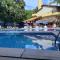 Amarilis Flat Maravilhoso - dentro de Riviera, com serviço de hotelaria, sauna e piscinas climatizadas