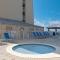 Beach House Condominium 202B by Newman-Dailey