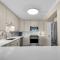 Beach House Condominium 202B by Newman-Dailey
