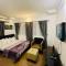 Elegance Oasis: Central 2BR Apartment with Balcony, View, and WiFI in Maitama