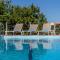 DIMITRA apartment with private pool and sea view -the ground floor of a two storey building - Daratso