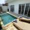 Chic Brand New 4 BR villa with Pool near The Beach