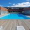 Vue sur le golf chez les grats-piscine-clim - 河镇