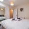 Spacious 2-Bedroom Condo With Free Parking On Site