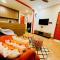 HomeEscape 1BHK Retreat Near Saket Square - Indore