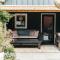Tiny house met heerlijke hottub & buitenkeuken - 海伦芬