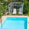 Greek Island Style 2 bedroom Villa with Pool next to the Sea