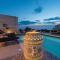 Sunset mood modern ap with a pool for 6