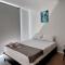 EM Somos AT HOME Lindo Apartamento con Aire Acondicionado