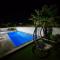 Apartmani Anastasia with pool, Novalja